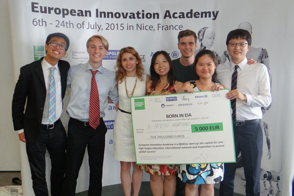 European Innovation Academy優勝直後の写真、チーフアドバイザーと一緒に (24歳、写真中央が森本さん)